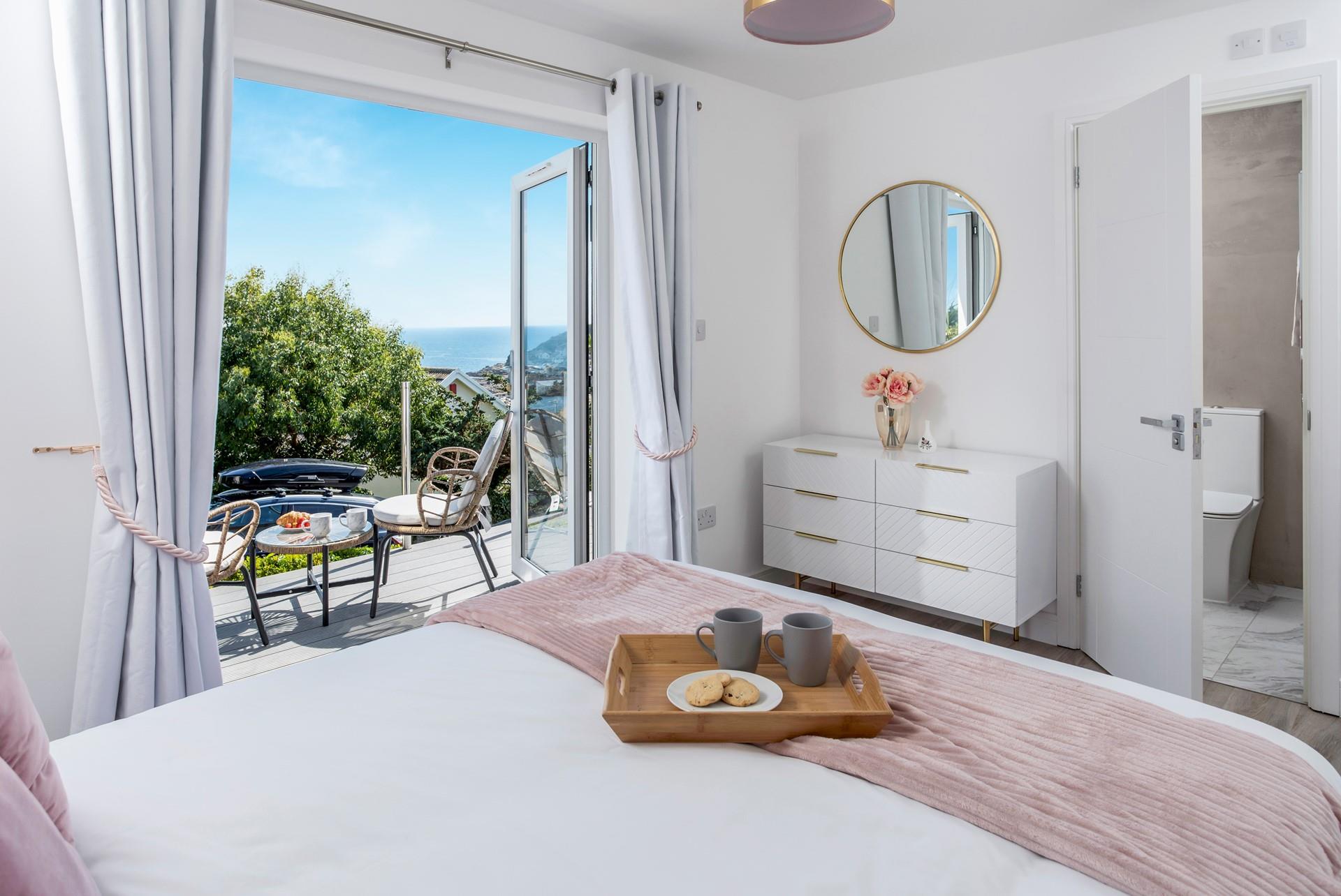 Awaken to sea views and step onto the balcony with your morning coffee.