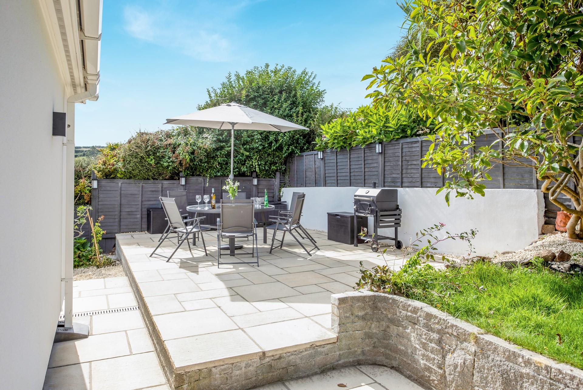 Sip a sundowner as the barbecue sizzles.