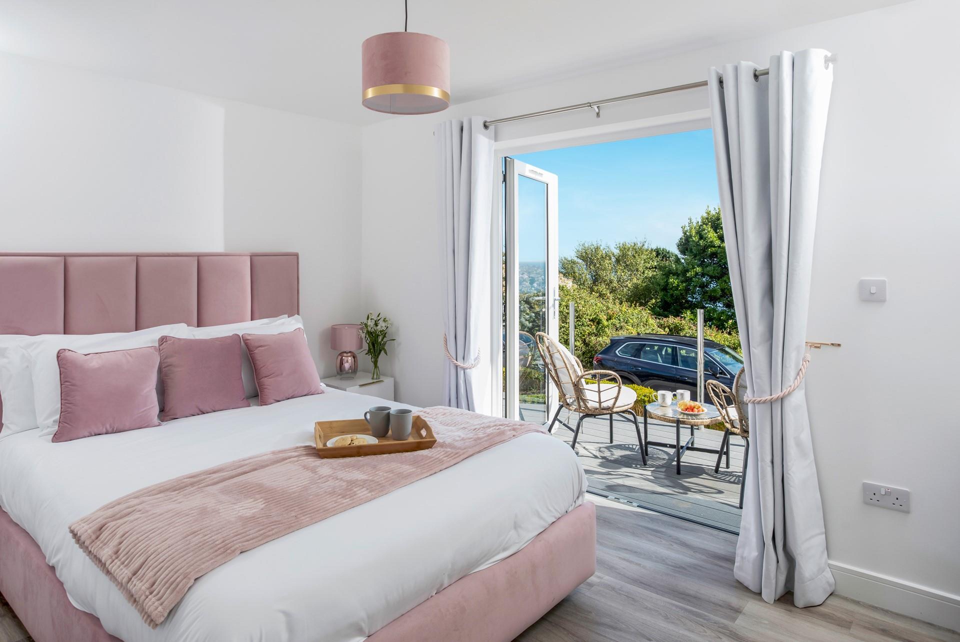 Open the balcony doors and breathe in the refreshing sea air.