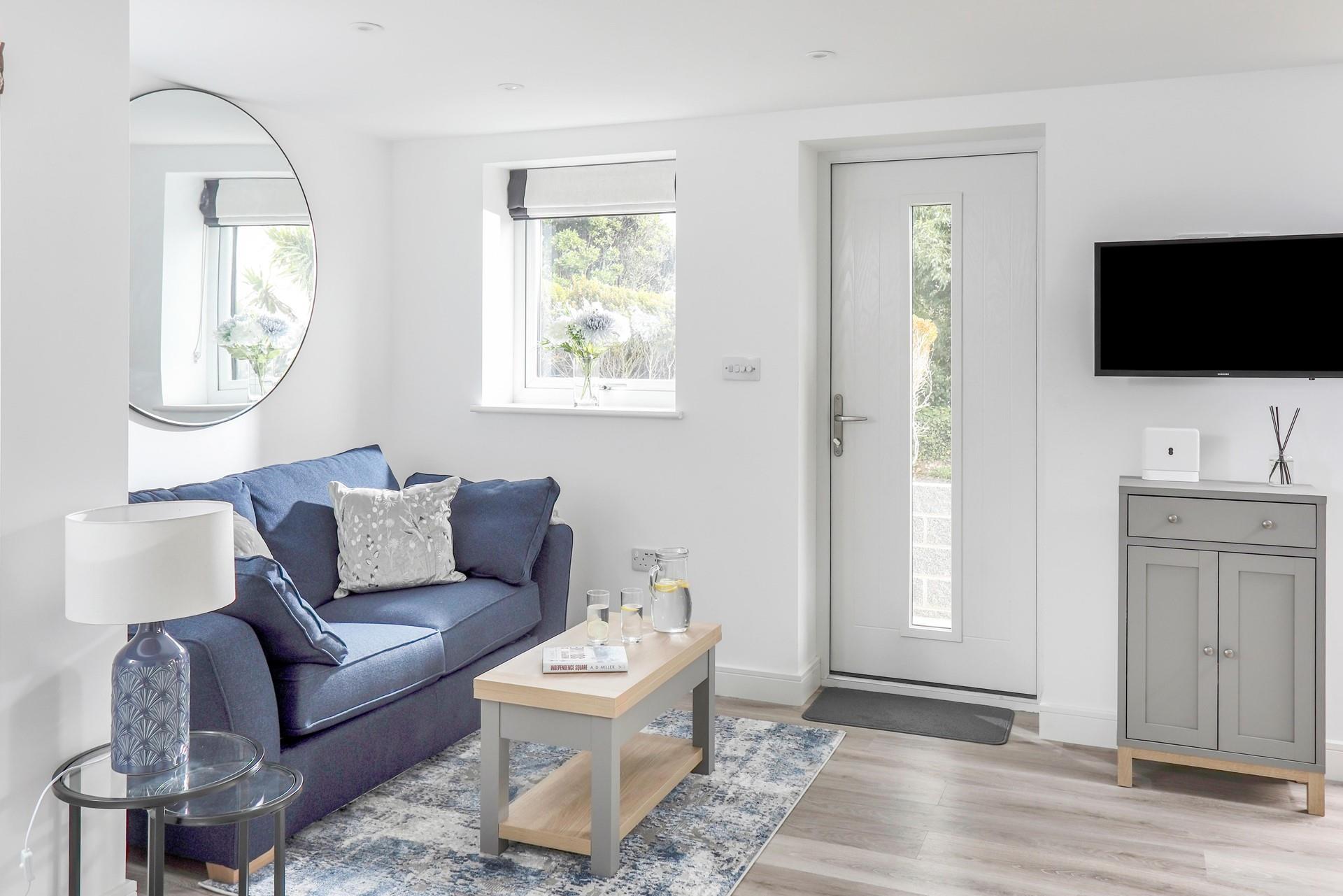 Sink into the sofa and enjoy a relaxing evening with a loved one.