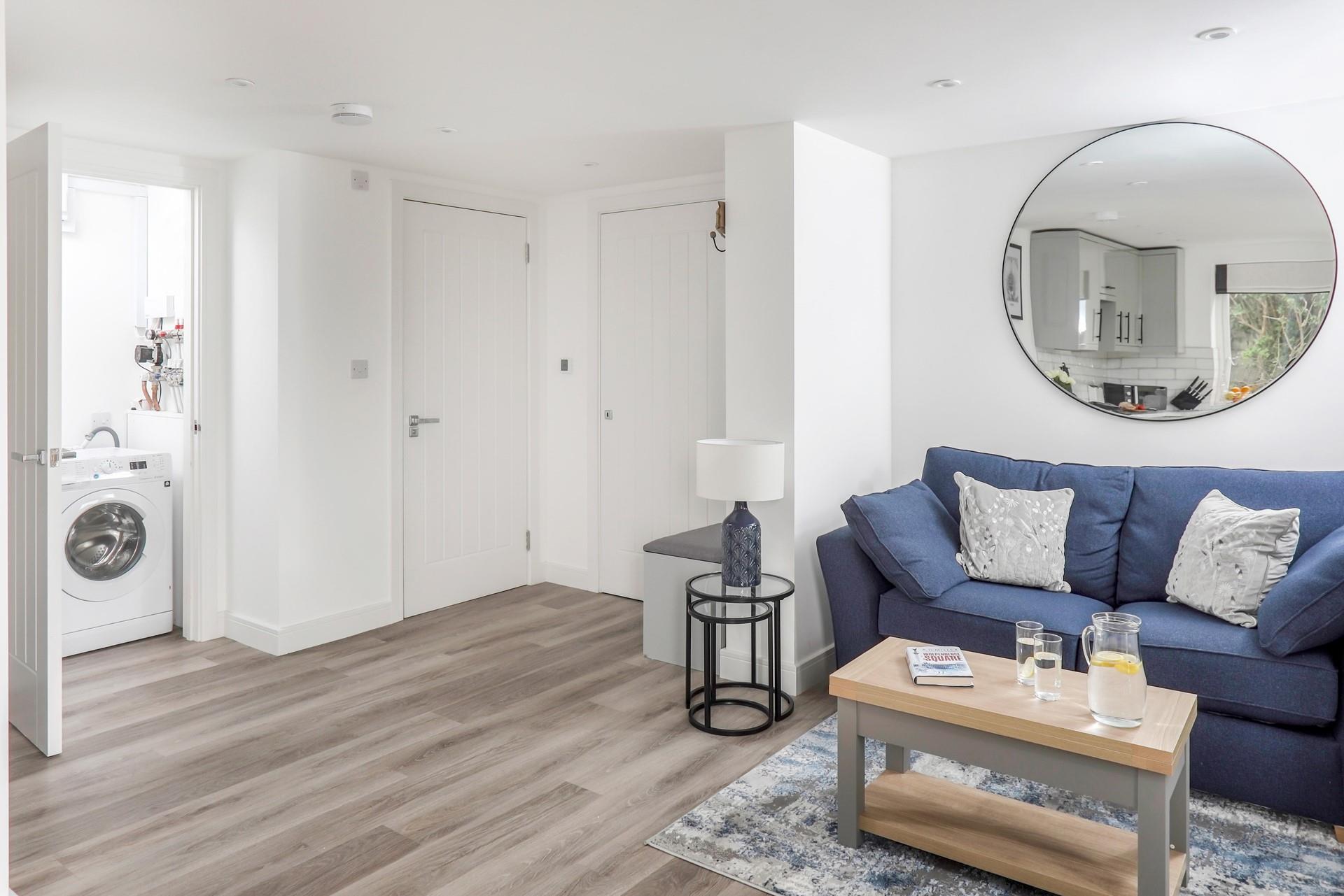 Modern and spacious, the apartment is filled with stylish decor.