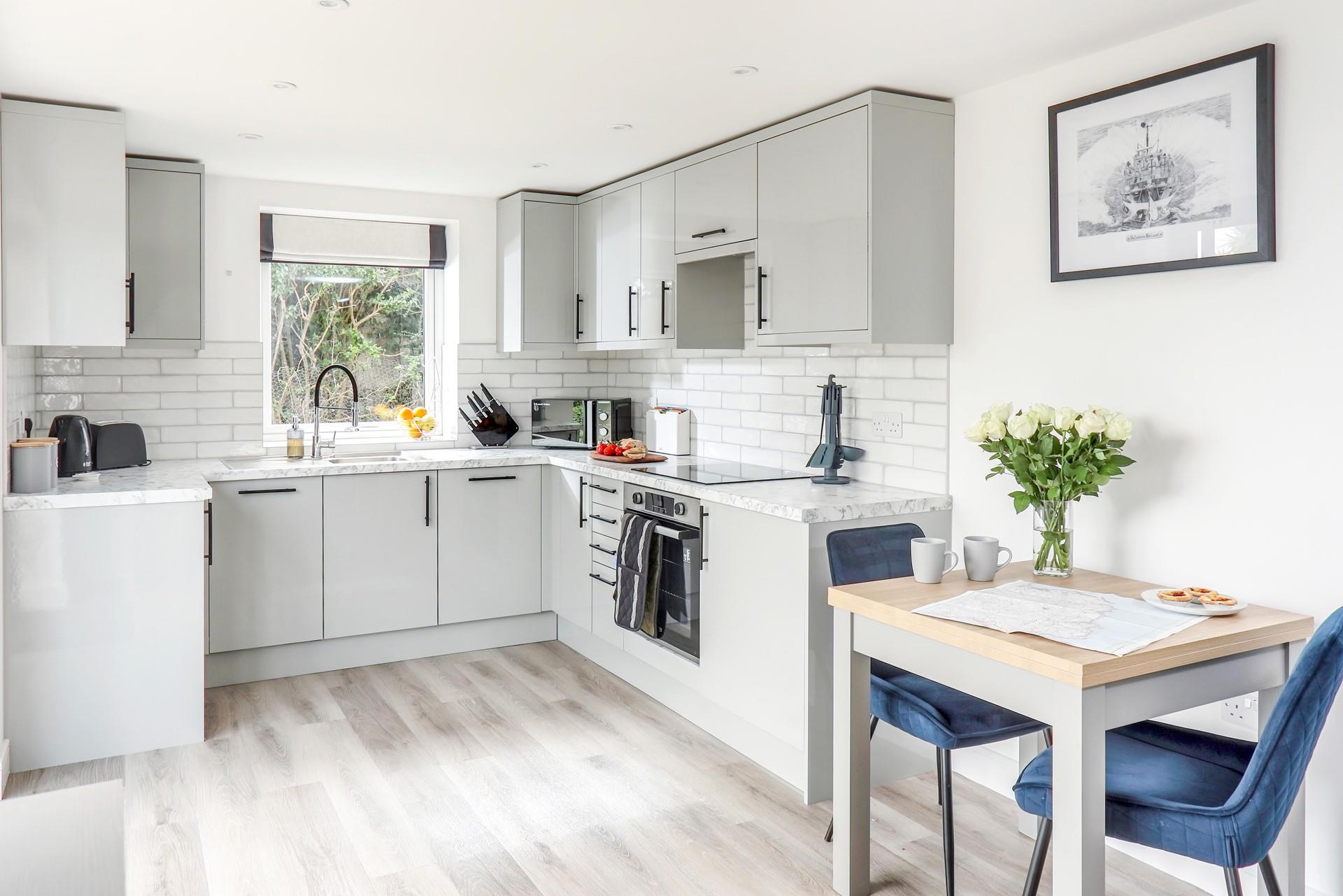 The kitchen is fully equipped for cooking tasty meals.