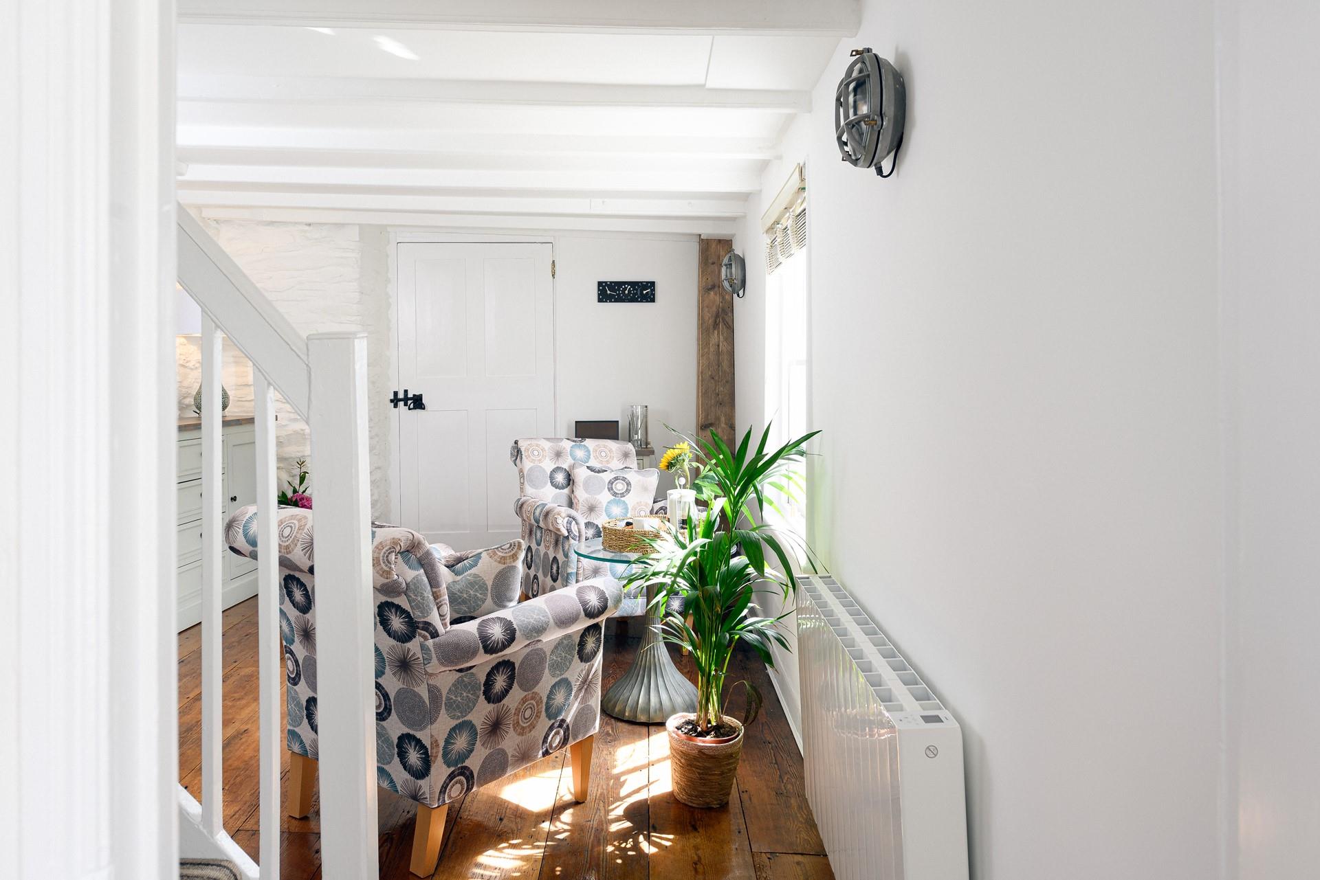 Step from the cottage and onto the bustling harbour.