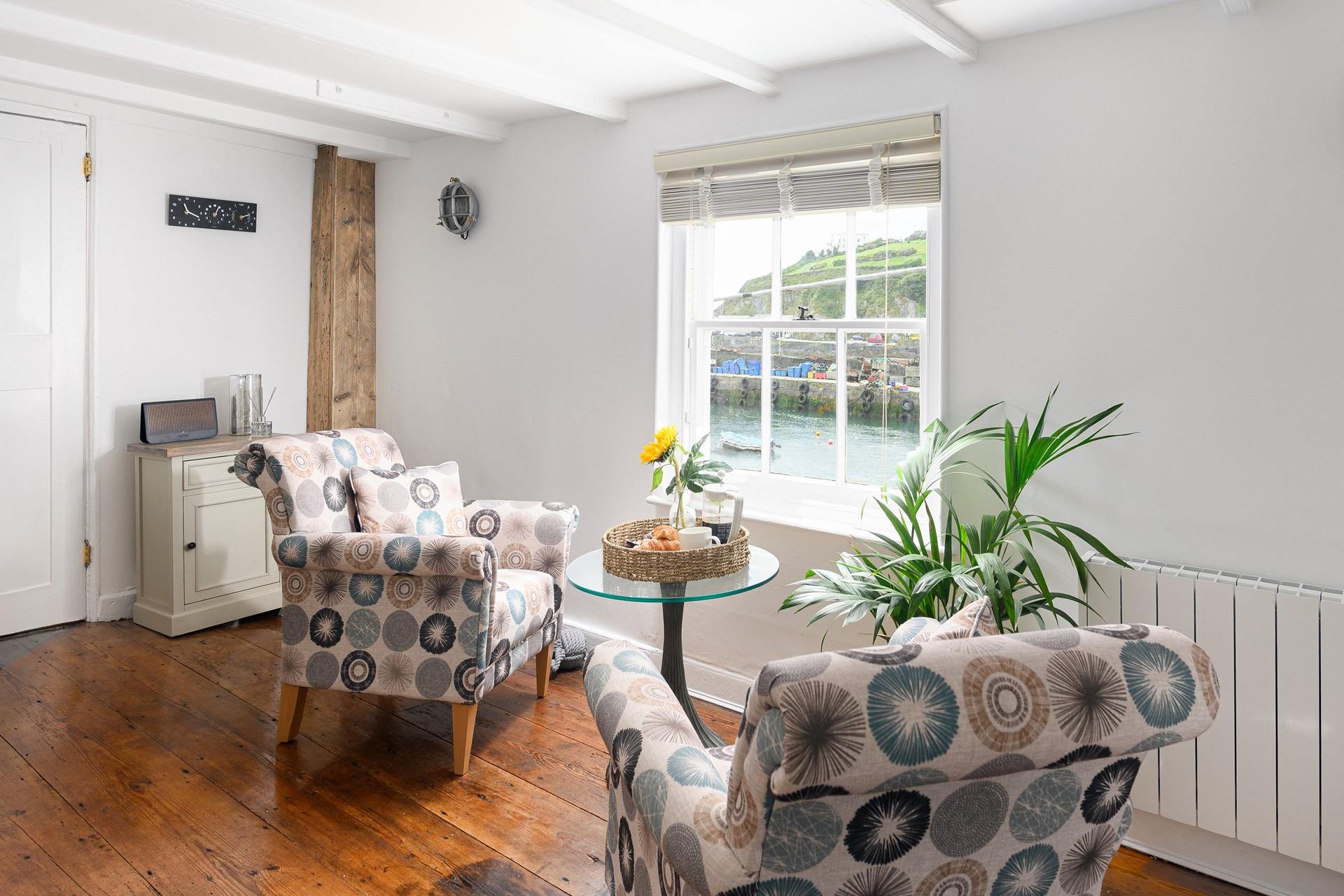 Relax, taking in the beautiful harbour views.