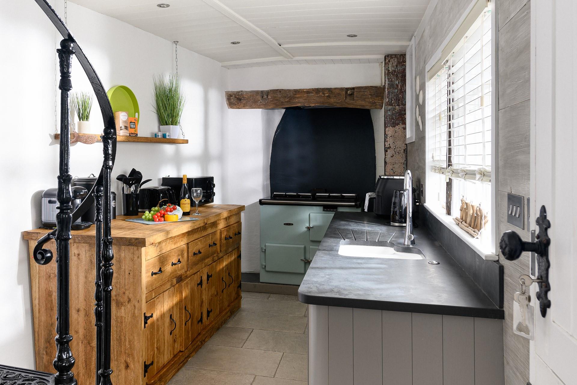 The beautiful kitchen blends old and new perfectly.