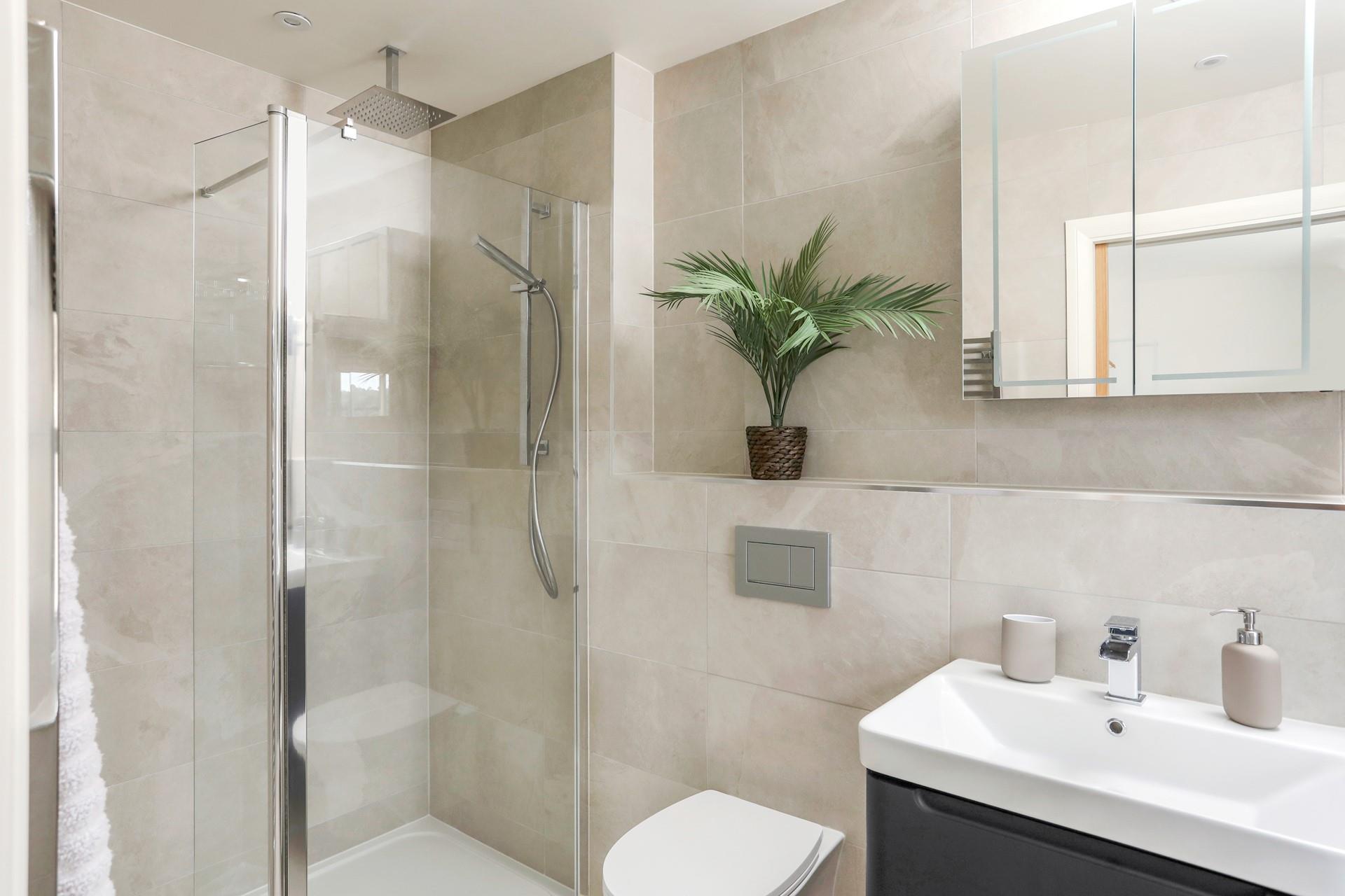 Get ready for the day in bedroom 1's en suite.