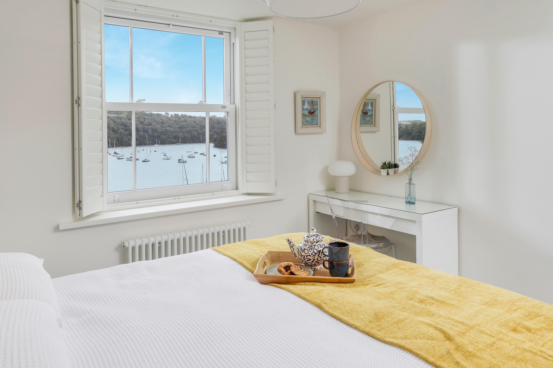 Bedroom 2 also has stunning views of the river.