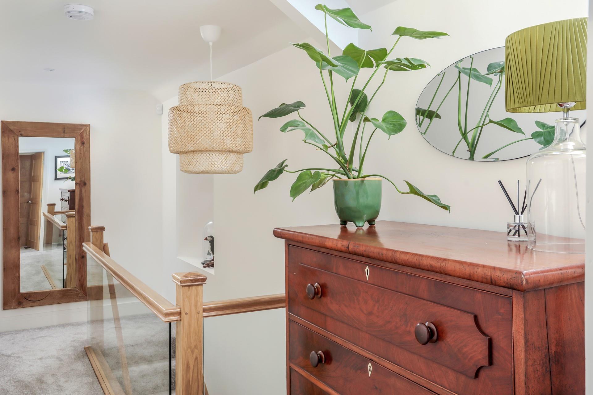Climb the stairs to the bedrooms after a day of exploring.