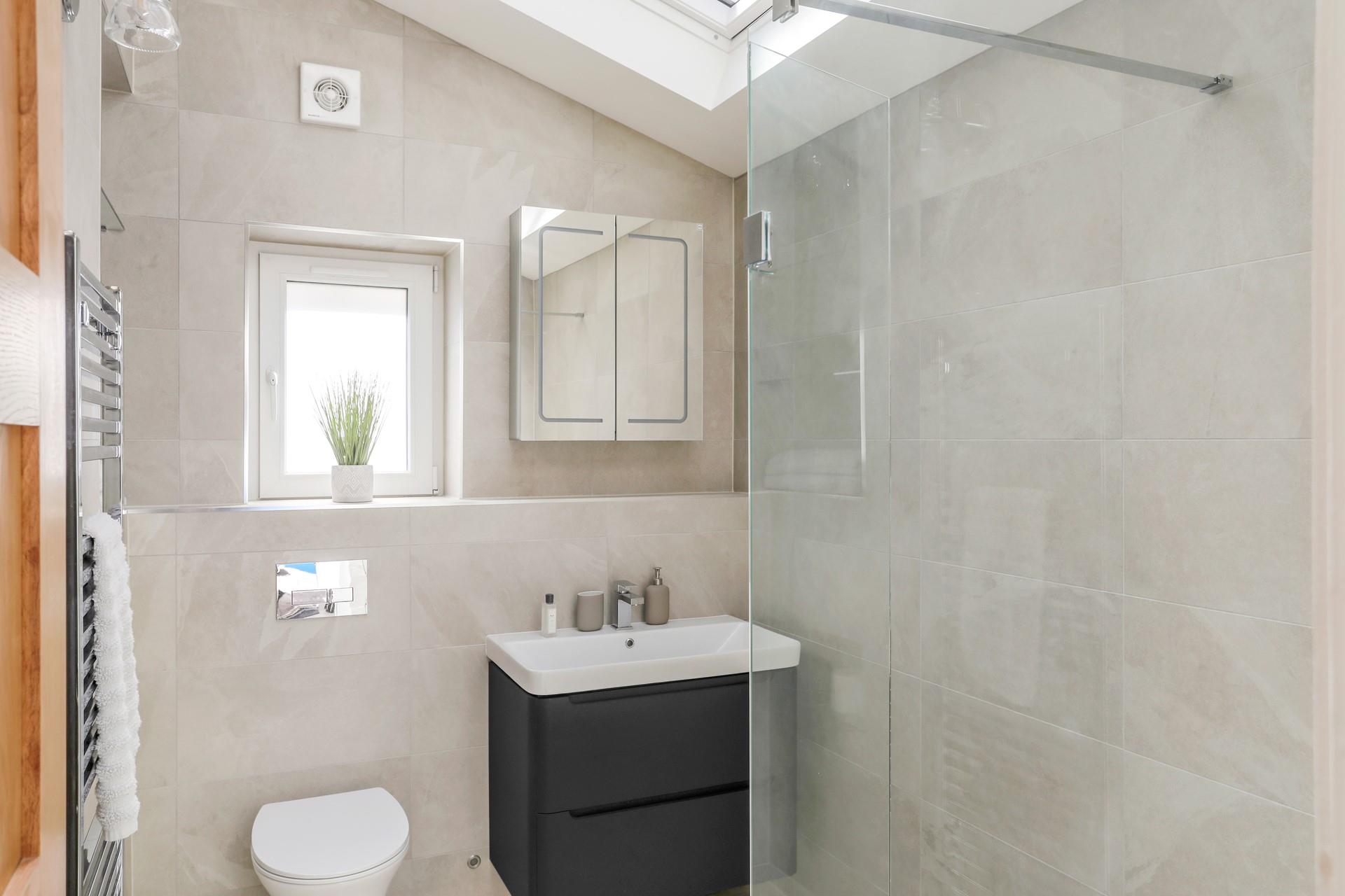 The bathrooms are modern and sleek, perfect for washing off sandy beach toes.