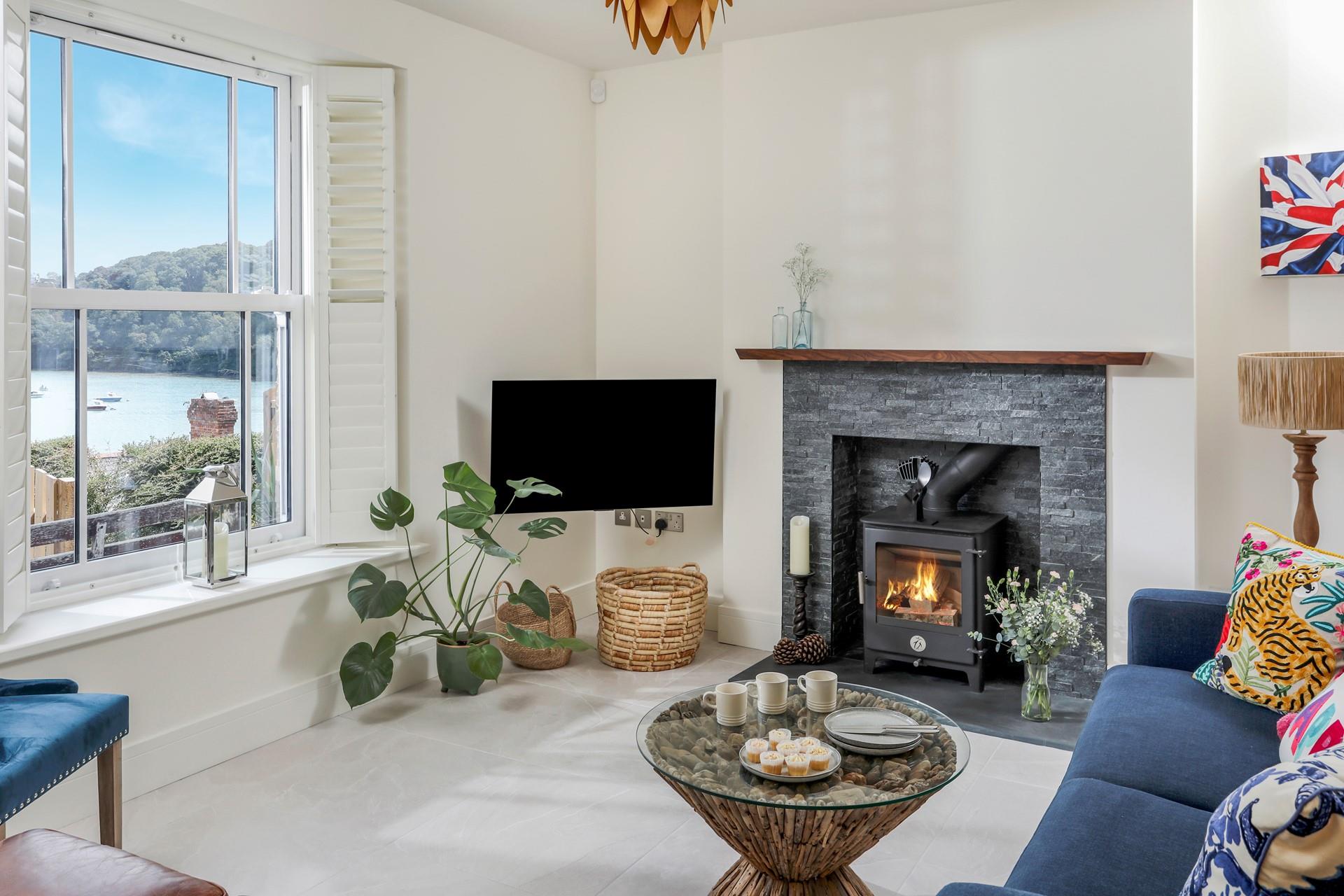 Snuggle up in front of the crackle of the woodburner watching the boats sail leisurely on the river.