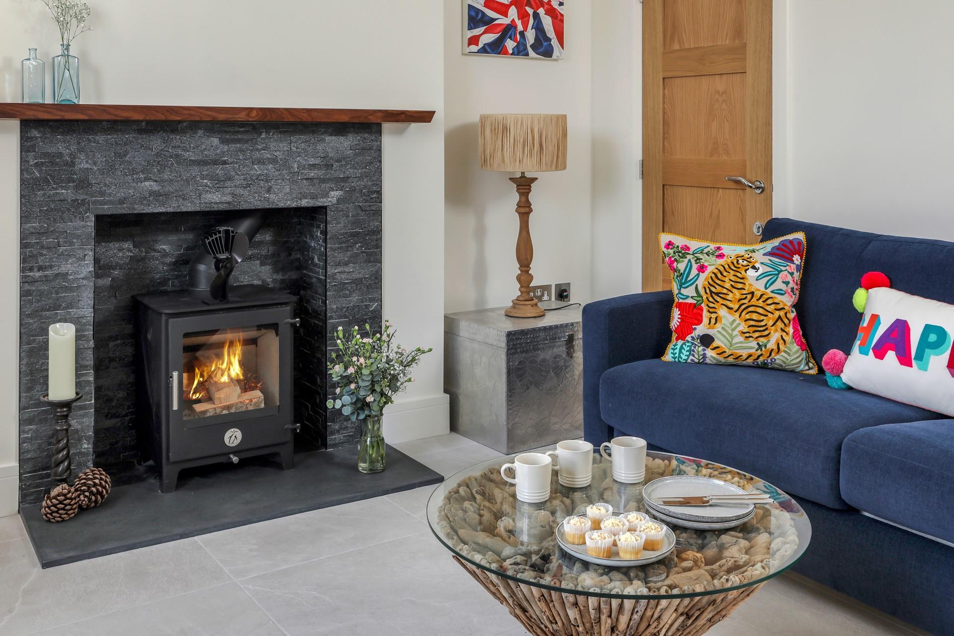 Enjoy tea and cake in the cosy sitting room.