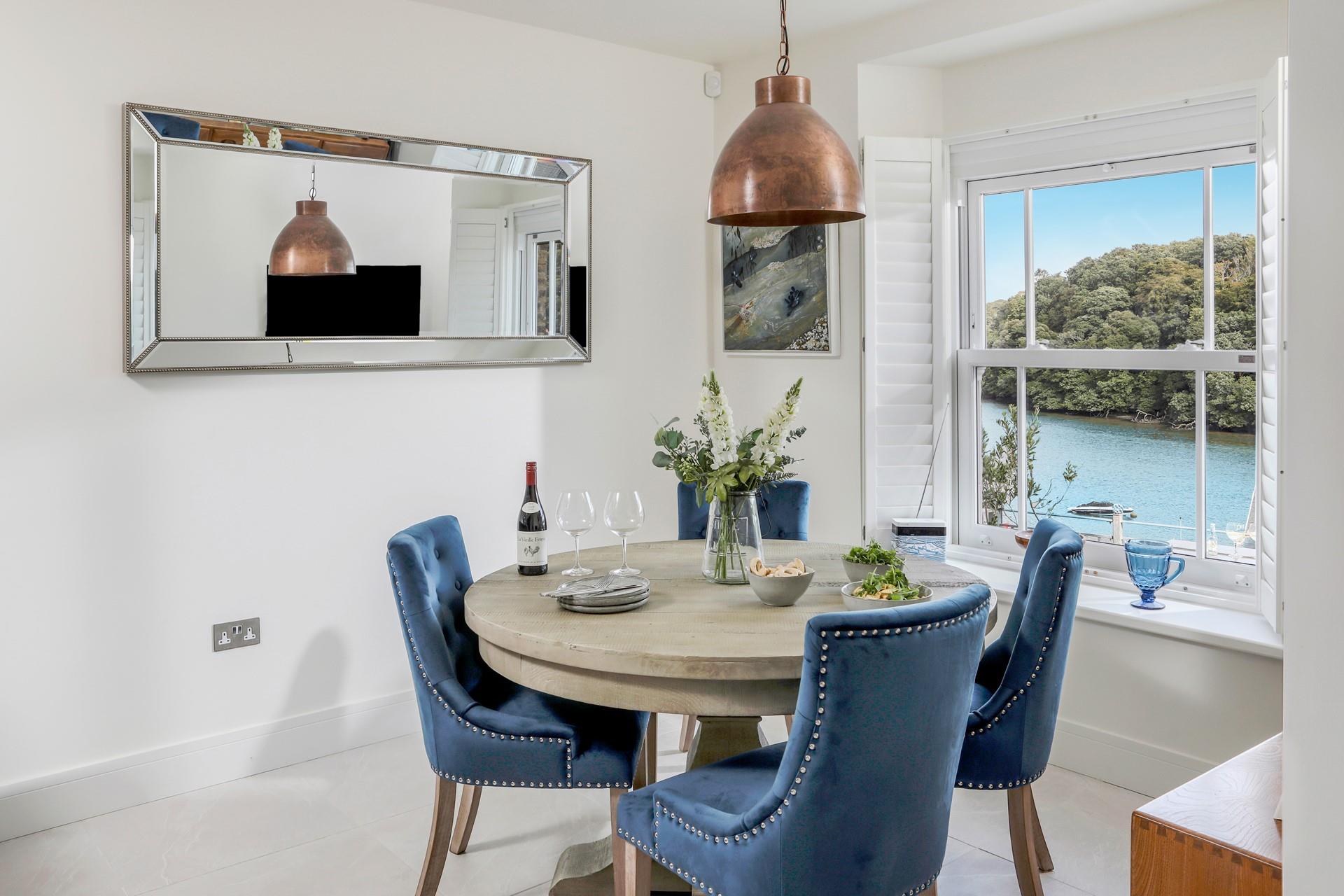 Enjoy the tranquillity of watching the boats go up and down the river.