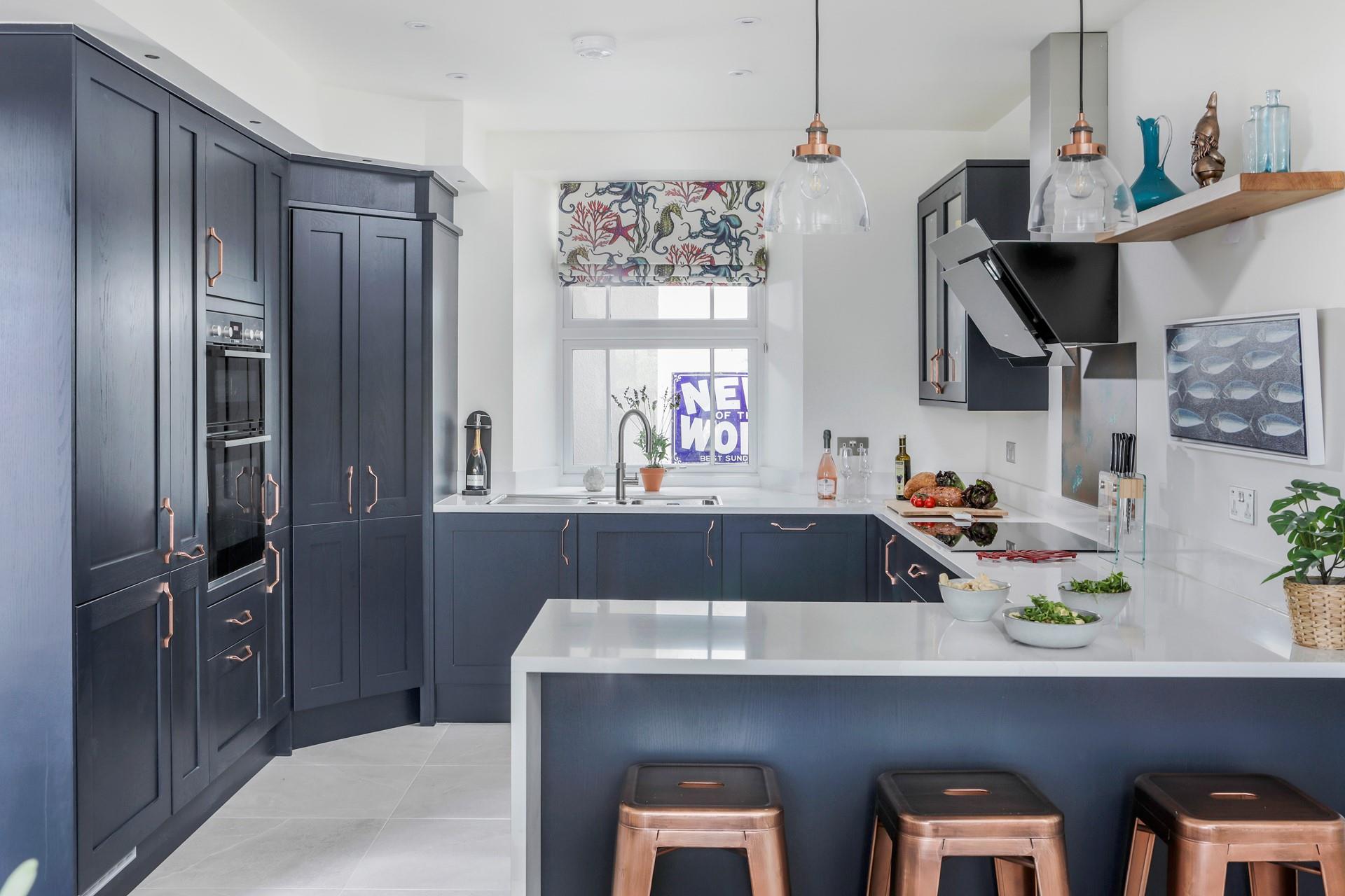 The large spacious kitchen is modern and stylish.