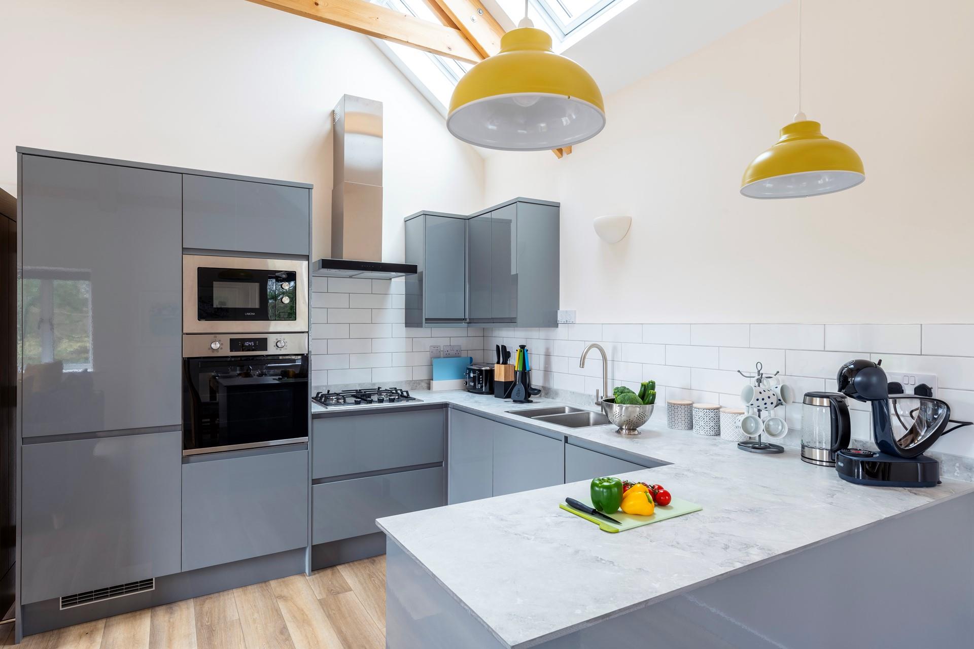 The modern kitchen is perfect for cooking up a storm at mealtimes.