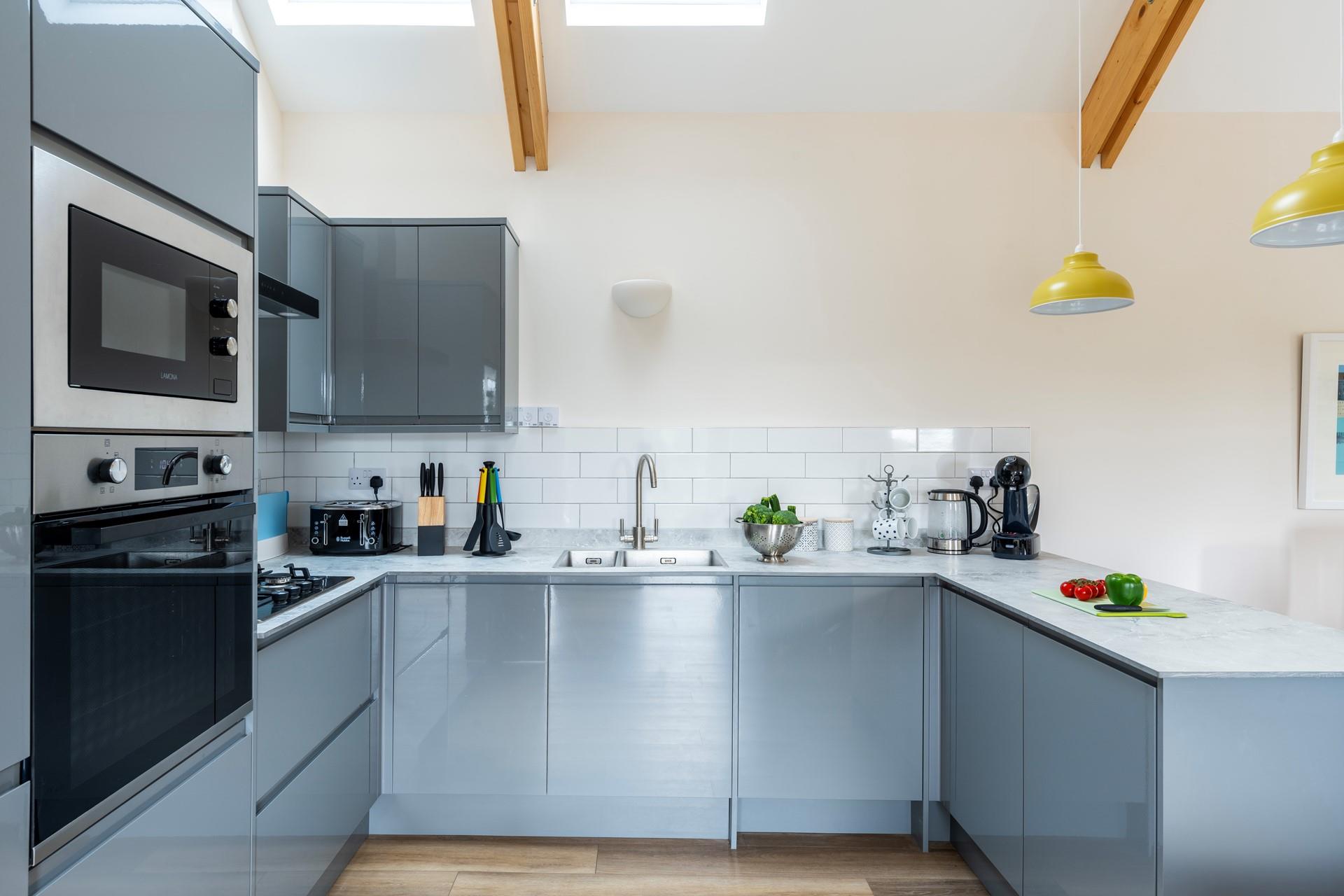 Prepare hearty meals for the family in the fully-equipped kitchen.