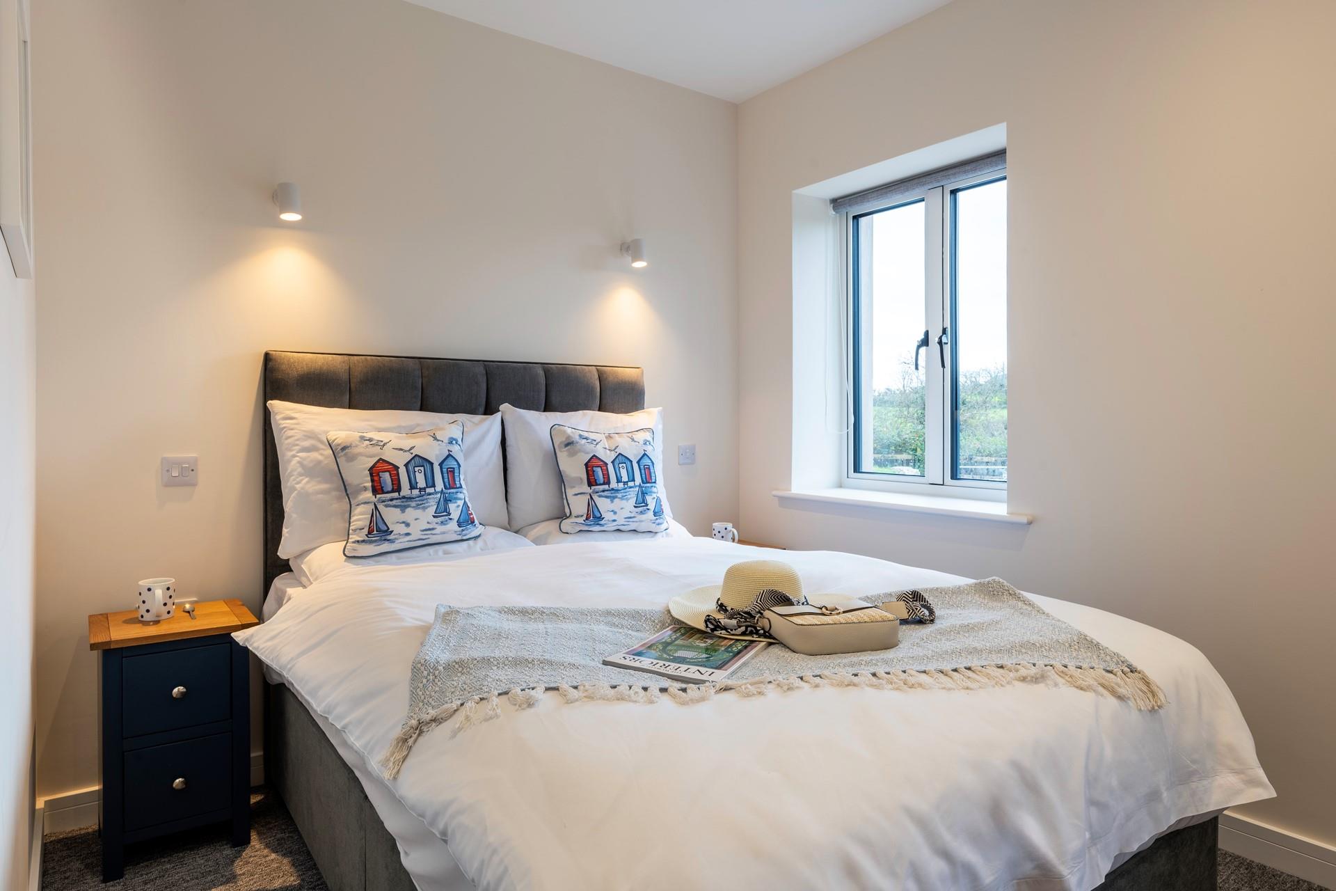 Bedroom 2 has a double bed for a relaxing night's slumber.