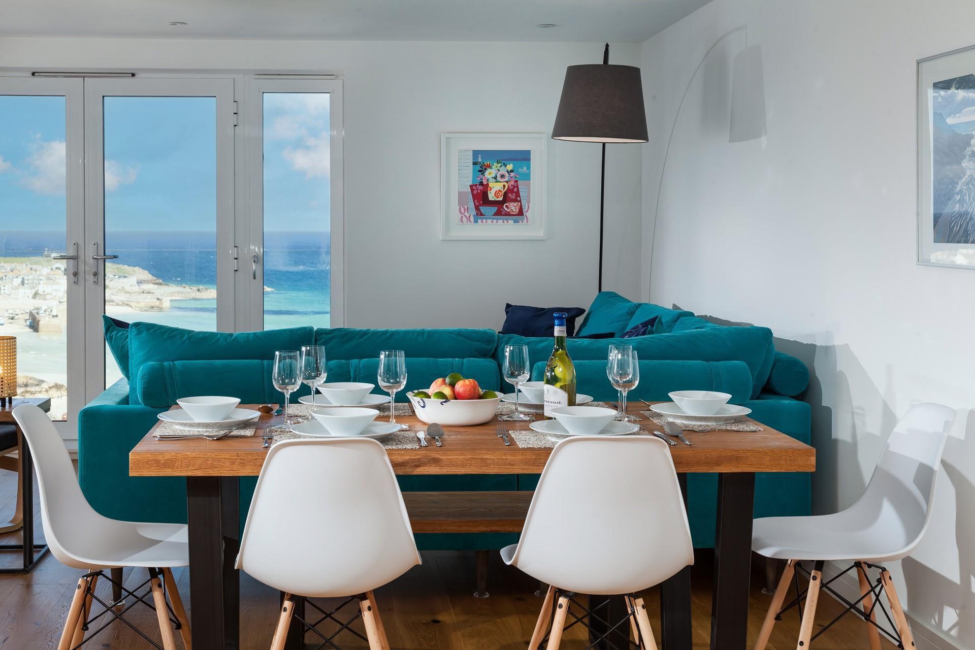 Gather around the dining table for dinner with a view.
