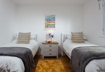 Bedroom 1 has twin beds perfect for young adults or children.