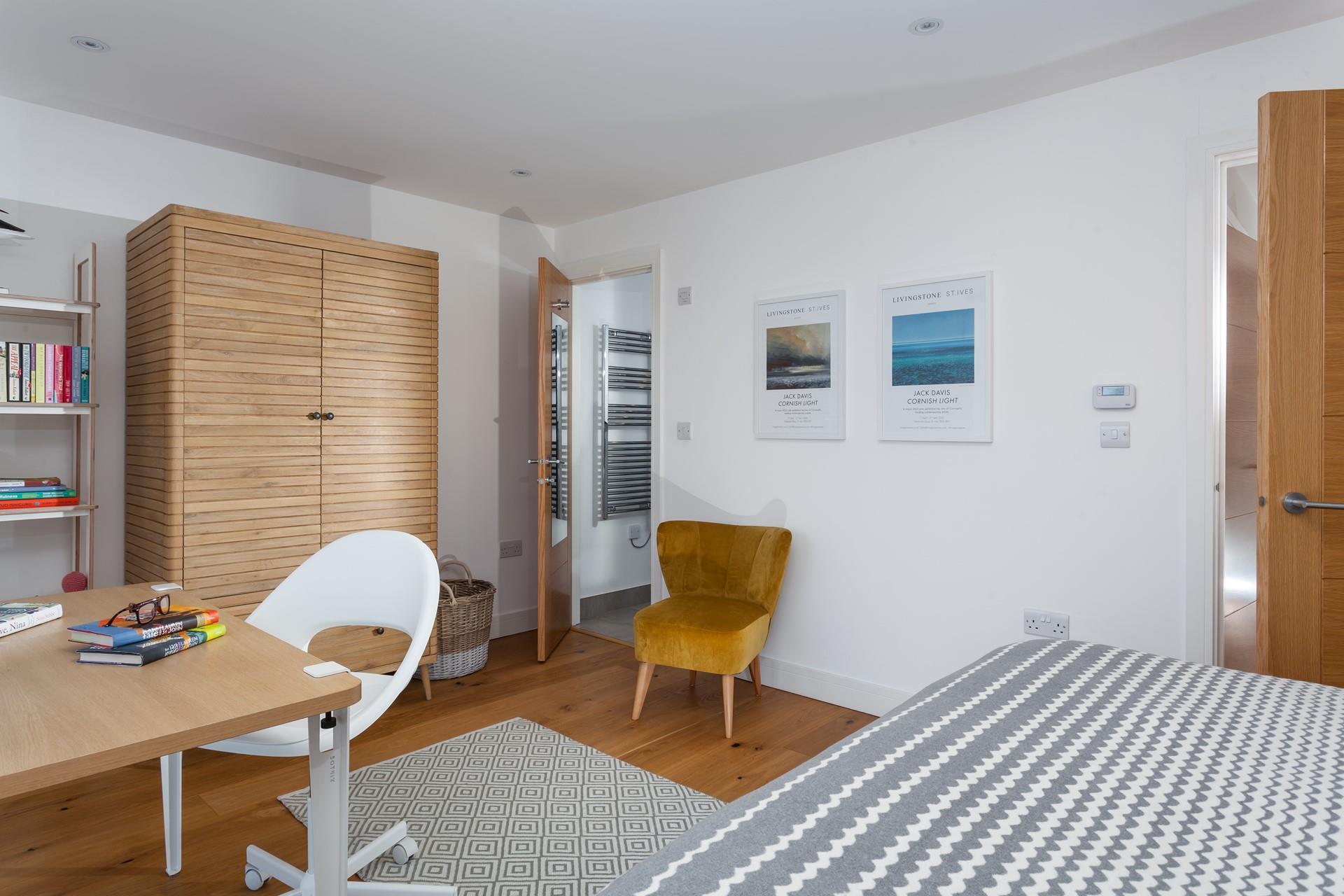 Climb out of bed and into the en suite to get ready for the day.