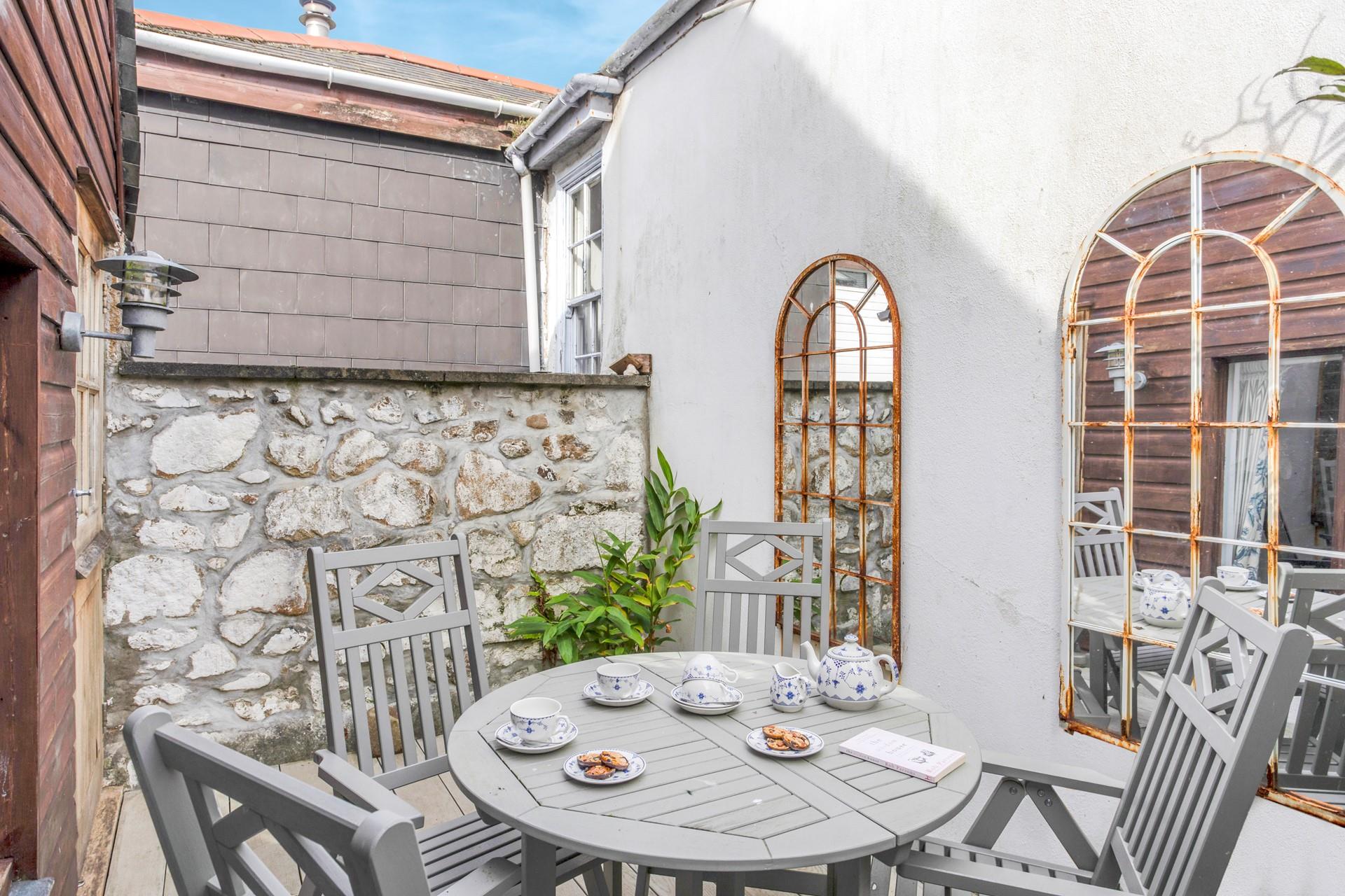 Take meals al fresco in the summer months.