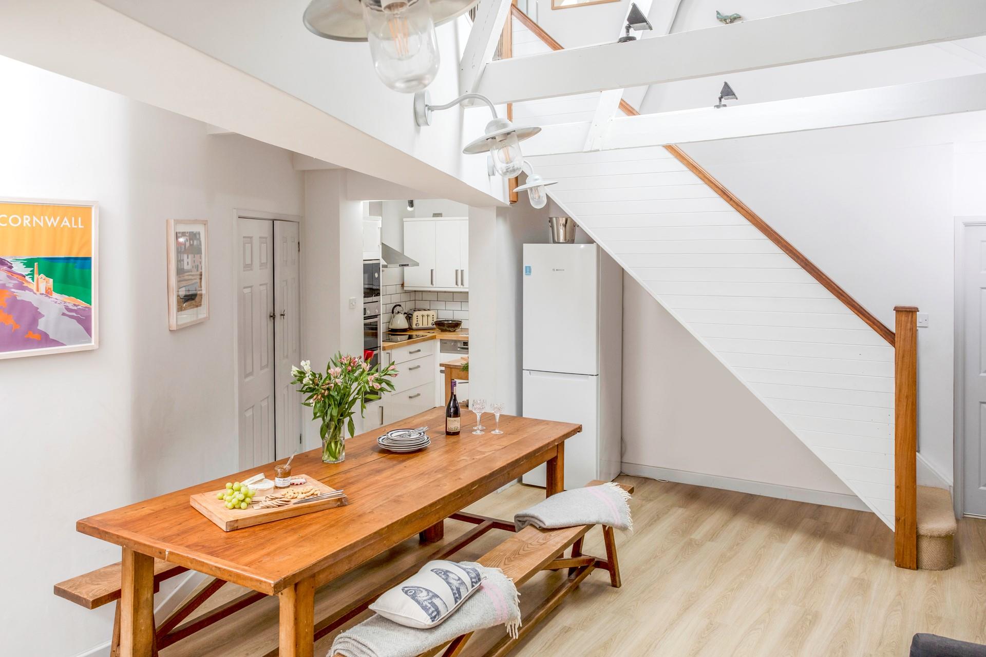 This reverse-level cottage is stylishly decorated whilst keeping original charming features.