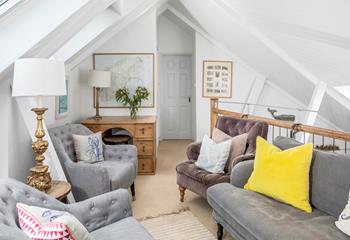 Sink into the comfortable sofa after a coast path stroll.