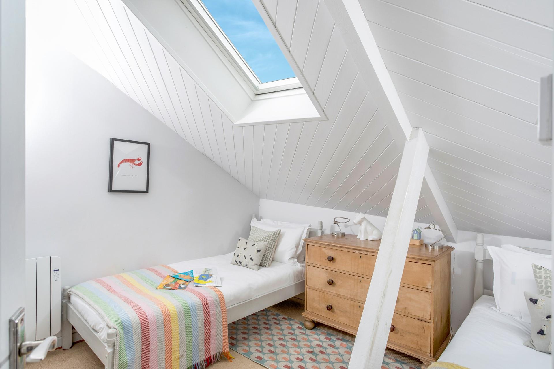 The twin room is the perfect space for the kids to relax.