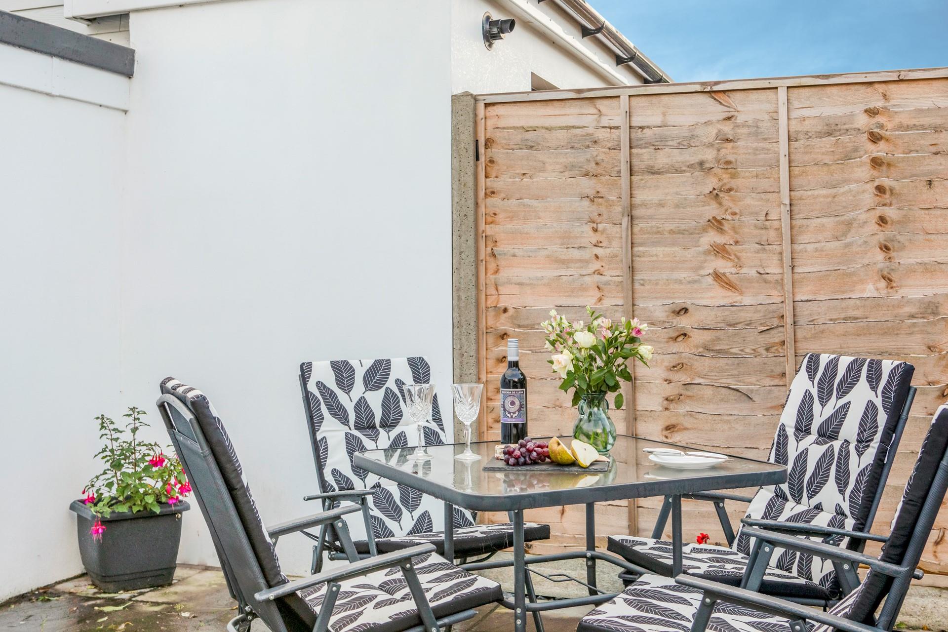 Enjoy meals al fresco on the patio.