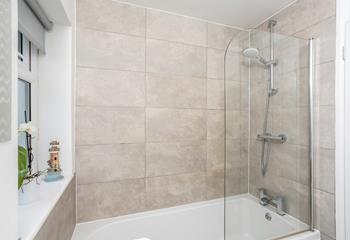 Choose between a shower or bath in the family bathroom.