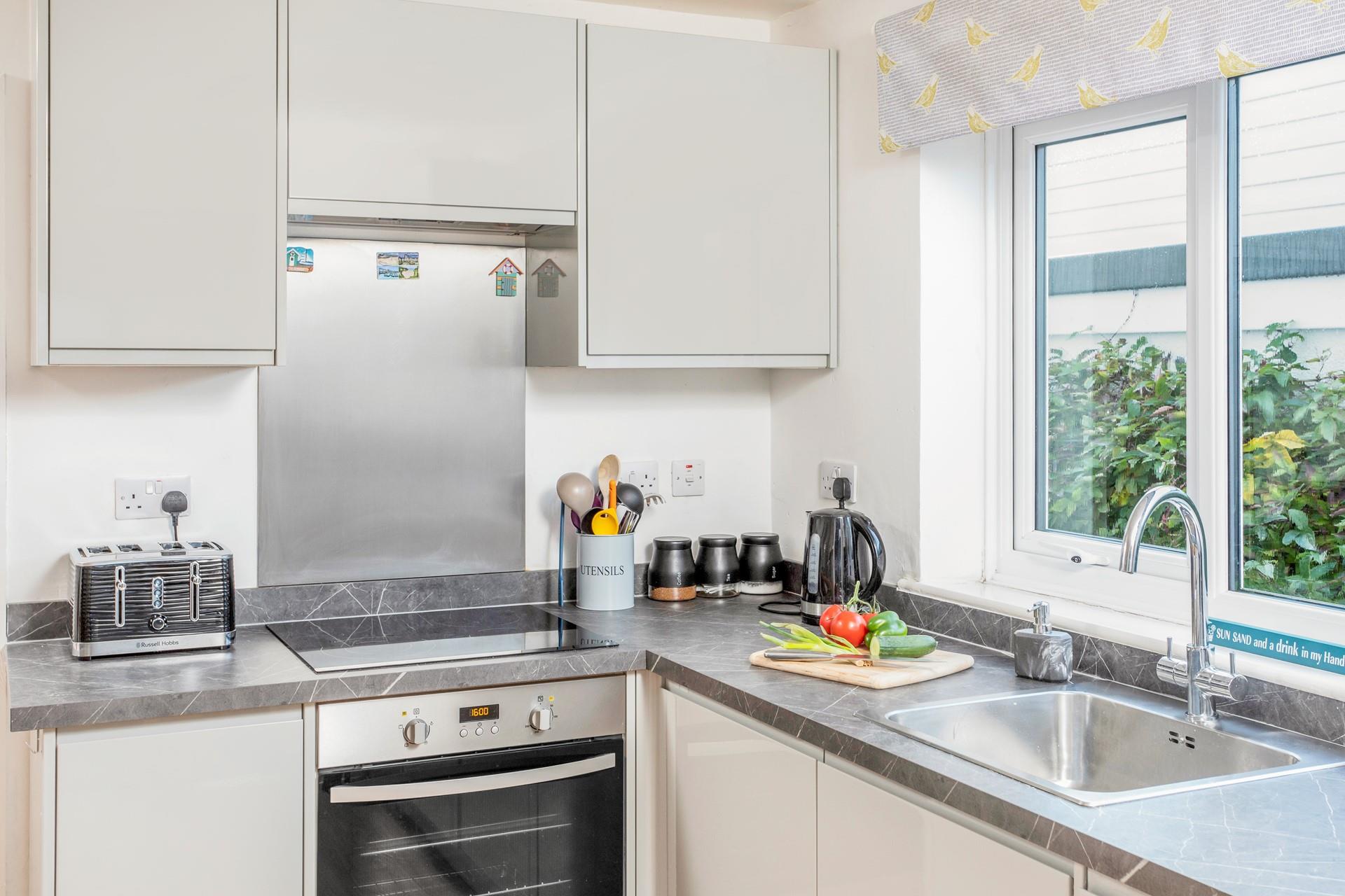 Cook up a storm in the well-equipped kitchen.