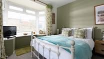 Bedroom 1 has a spacious double bed to tuck into.