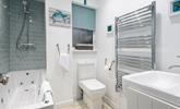 Wash off sandy toes after a day on Porthmeor beach in the modern family bathroom, or indulge in a soak in the jacuzzi bath. - Thumbnail Image