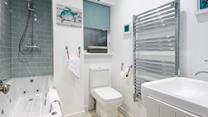 Wash off sandy toes after a day on Porthmeor beach in the modern family bathroom, or indulge in a soak in the jacuzzi bath.