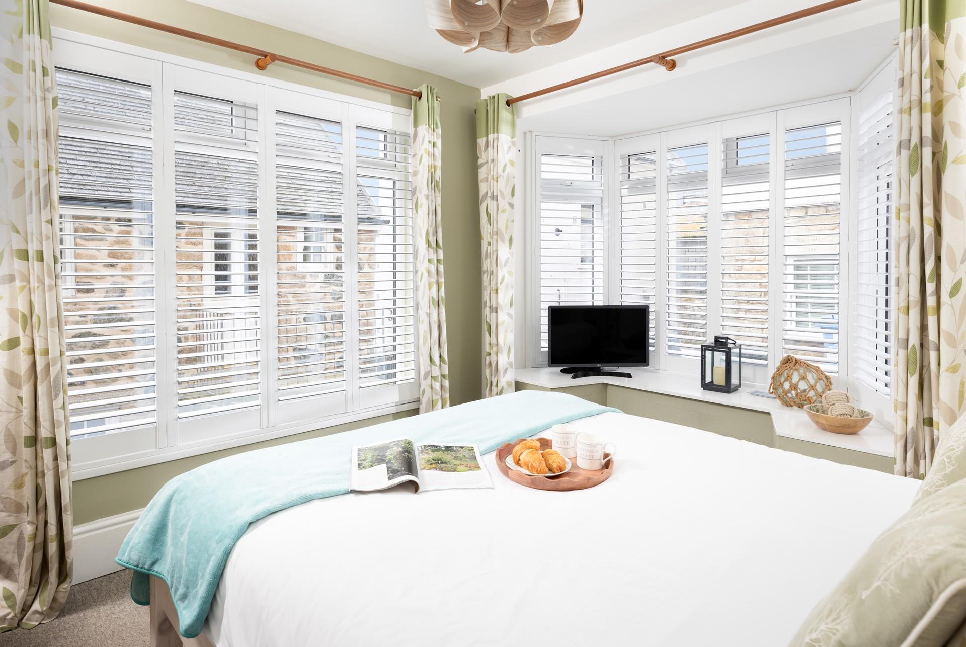 Bedroom 1 has a spacious double bed to tuck into.