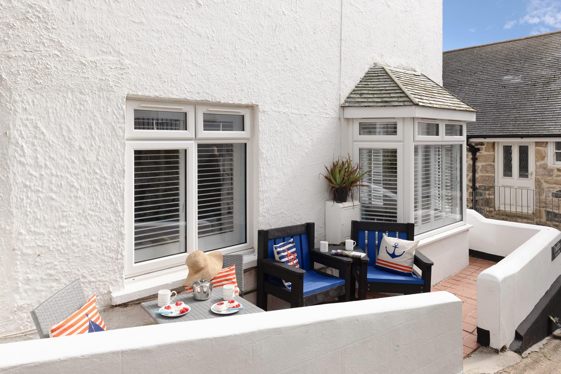 Sip your morning cuppa in the summer sunshine.