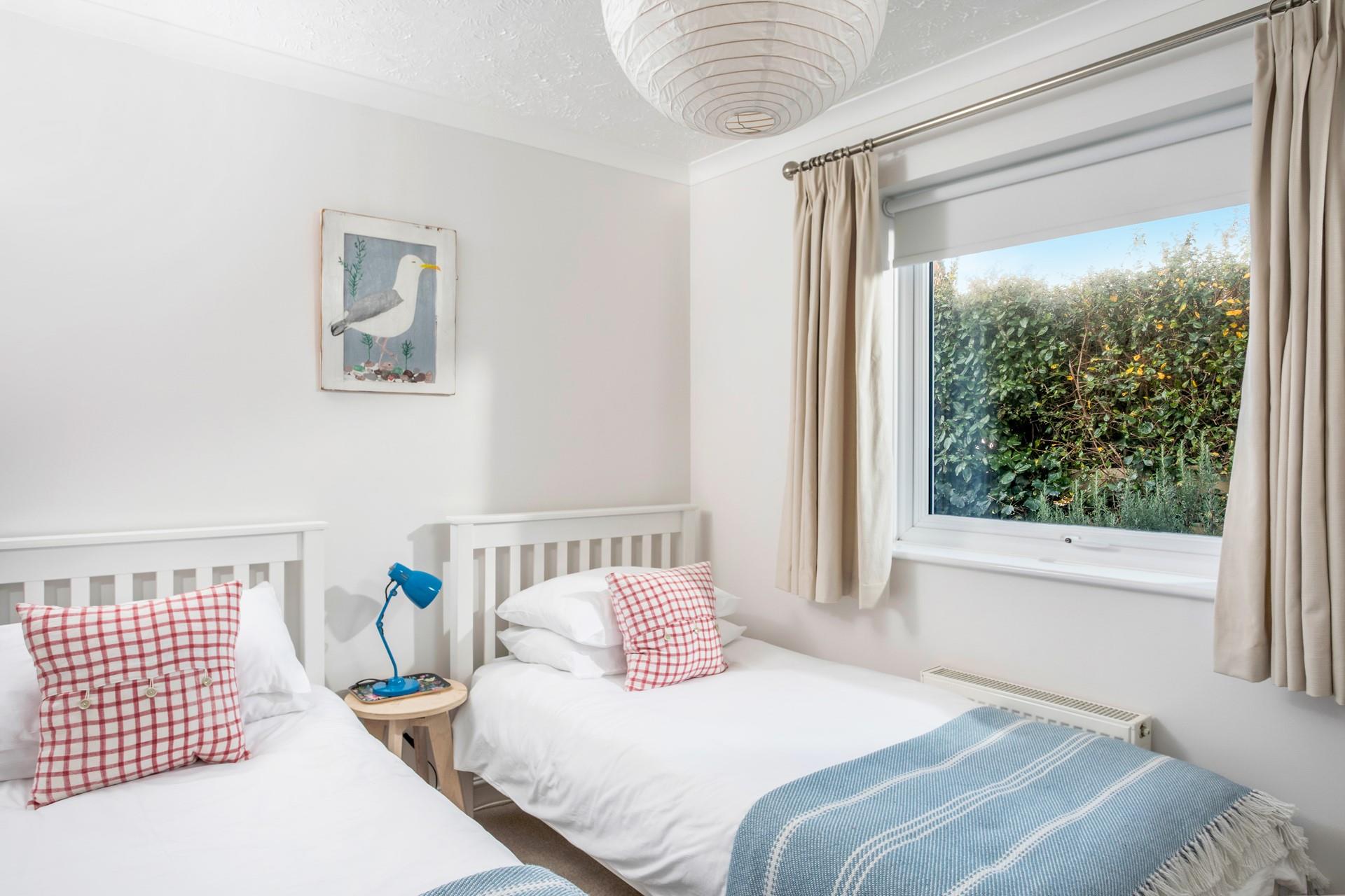 The twin beds are perfect for young adults or children.