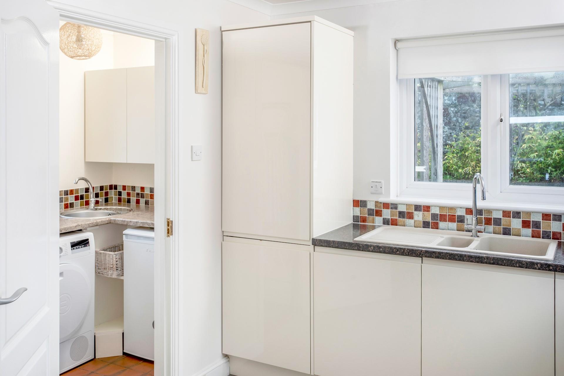 Wash clothes ready for the next beach day in the utility room.