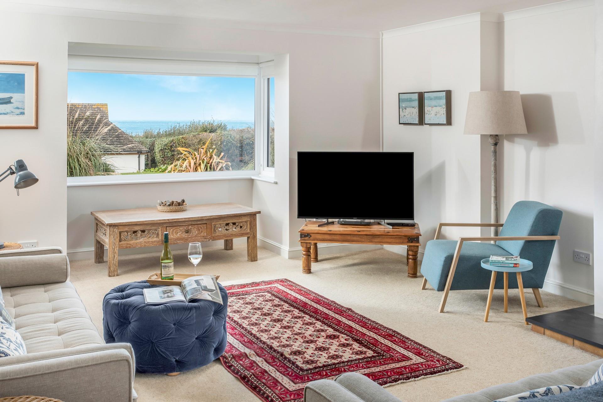 Enjoy a family movie night in the sitting room.