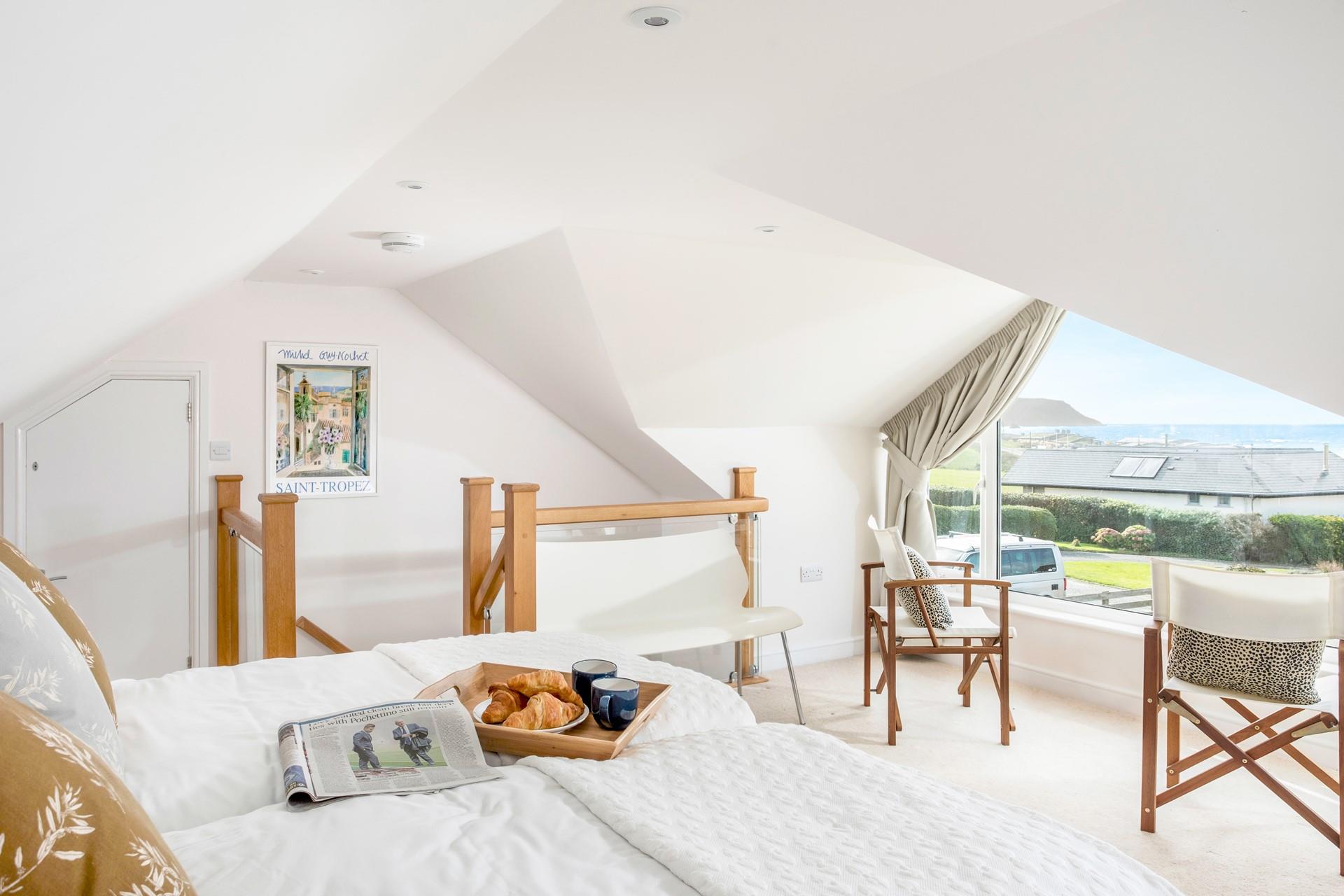 Watch the sun come down on another day from the comfort of the super king bed.