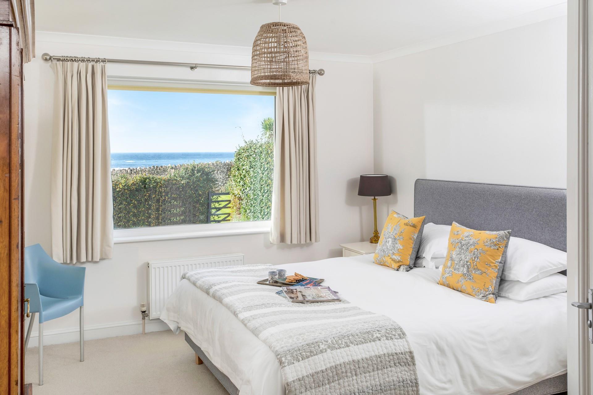 Bedroom 1 has a sumptuous king size bed for a relaxing night's slumber.