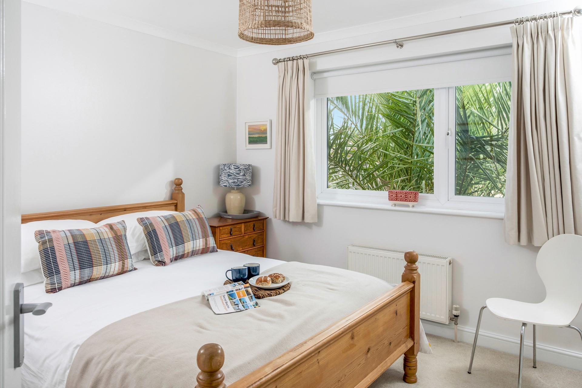 Open the curtains to check the day's weather and decide on the day's plans.