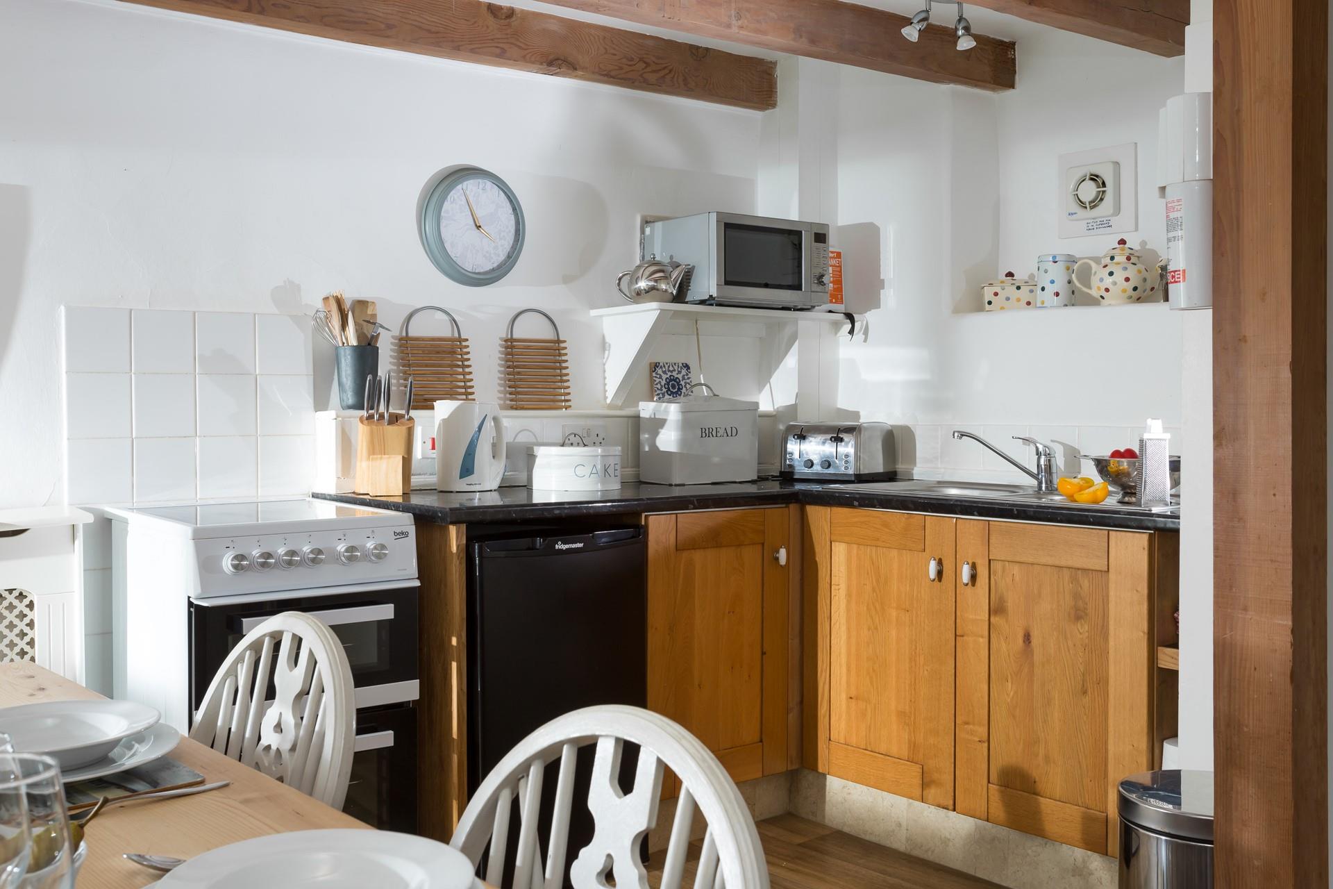 The compact kitchen has all you need.