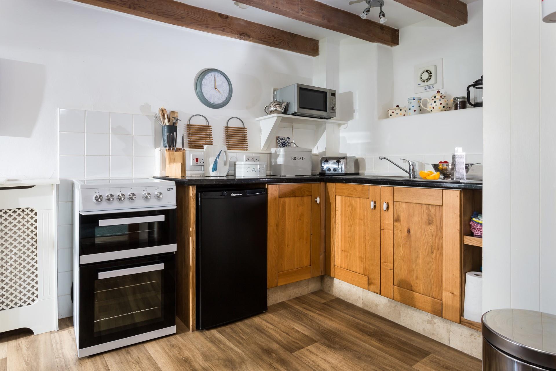 Cook up a storm in the well-equipped kitchen.