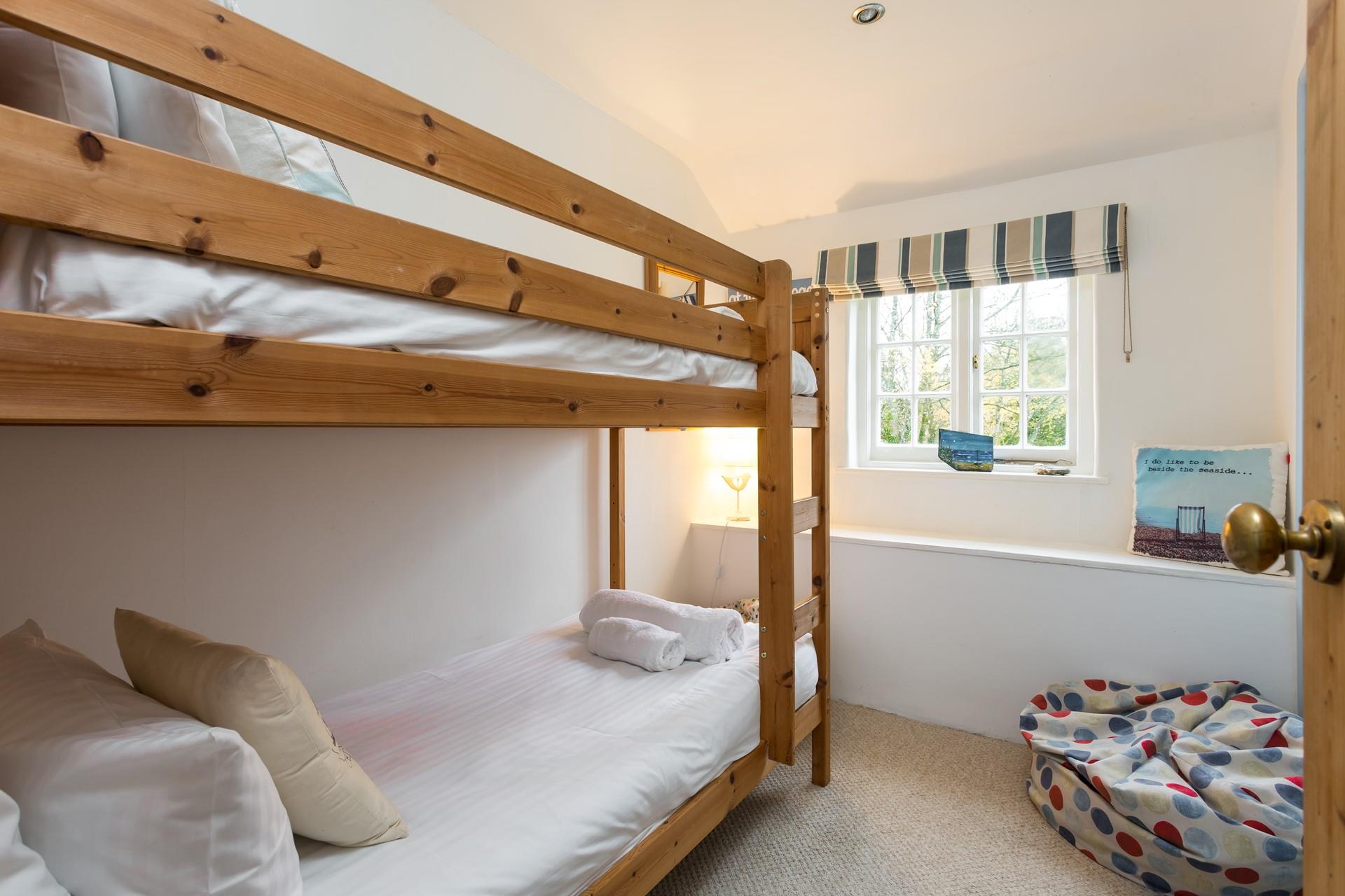 Little ones will love a holiday sleepover in bunk beds.