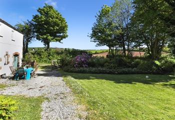 Watch the little ones play in the garden whilst you relax in the sun.