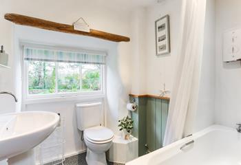 The family bathroom is perfect for washing off sandy toes after beach days.