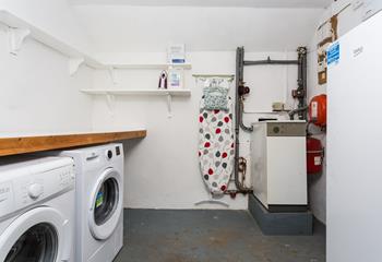 The utility has a washing machine and tumble dryer.