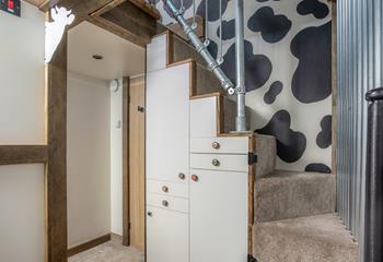 We love the quirky wallpaper in this charming cottage!