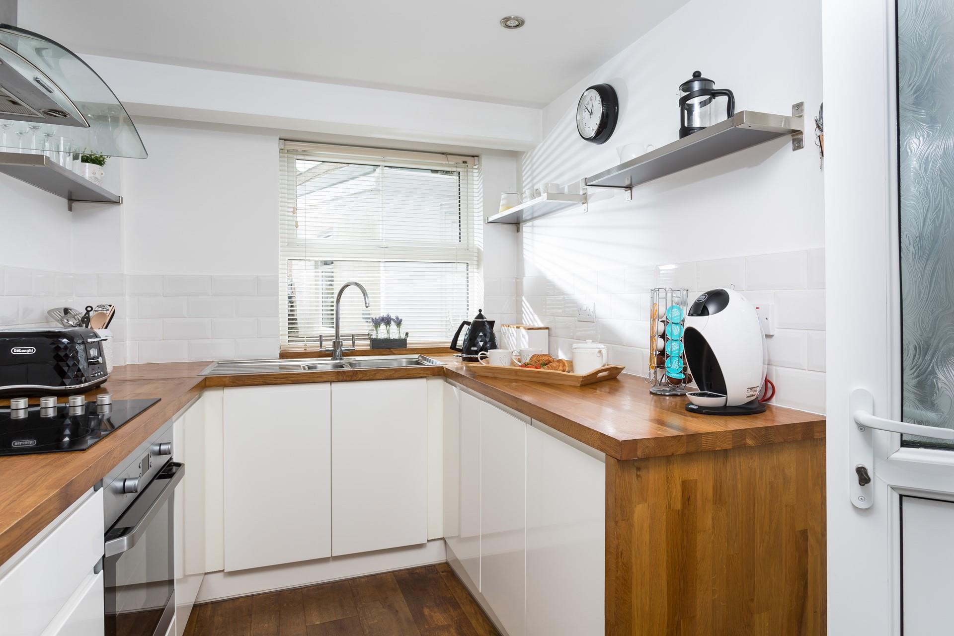 The kitchen is well-equipped for cooking tasty meals.