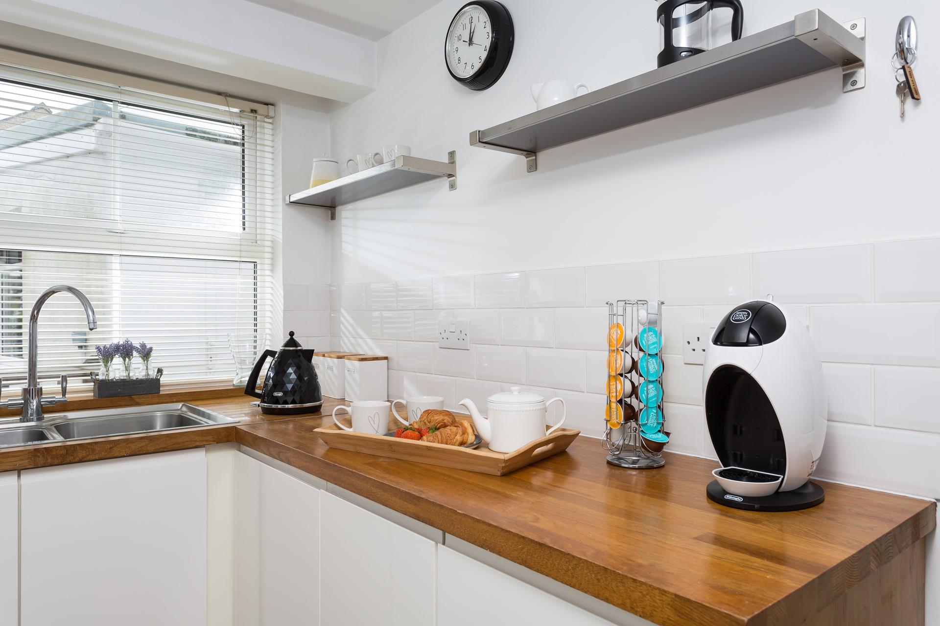 Enjoy a fresh coffee from the machine to begin the day.